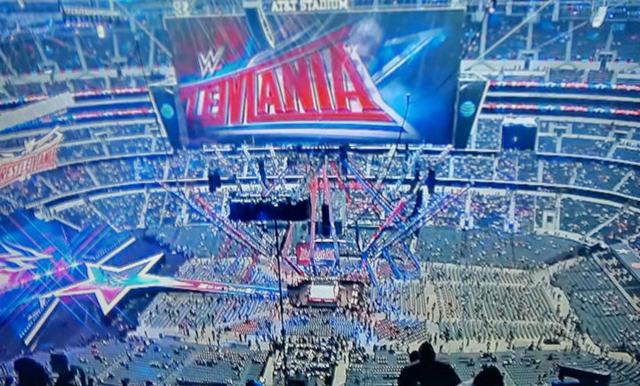 WrestleMania draws 100,000 fans, 90,000 of whom will watch entirely on big screens