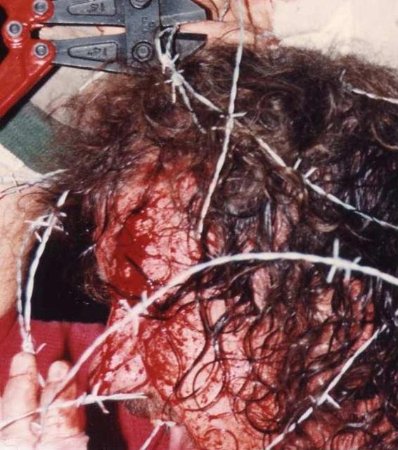 Terry Funk has accidental barbed-wire deathmatch with barbed-wire fence
