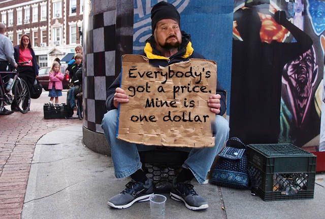 Down-on-his-luck DiBiase begs passersby to shove money in his mouth