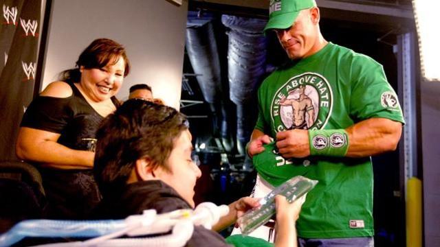 Make-A-Wish kid wearing CM Punk shirt visibly disappointed when Cena shows up