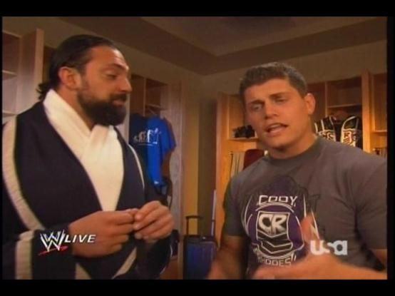 Wrestlers apparently don’t notice camera crew filming their “secret” conversation