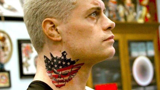 Wrestler once nicknamed “Dashing” now has a winged stars-and-stripes demon skull or something tattooed on his neck forever