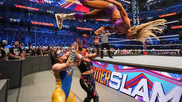 Charlotte Flair delivers graceful moonsault that almost makes contact with opponent!
