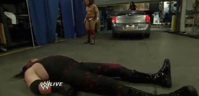 Daniel Bryan terrorized by masked libertarian