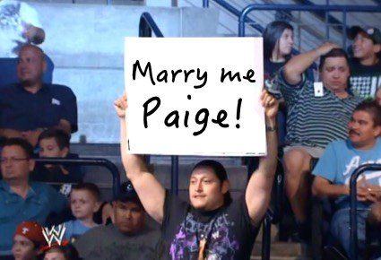 Fan with “Marry Me Paige” sign pretty sure it’ll work