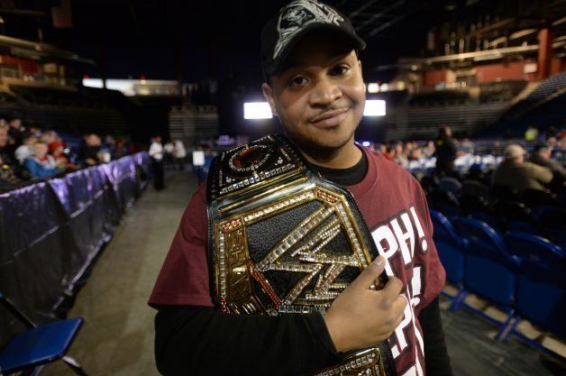 Fan with replica belt walking around like he’s pretty hot shit