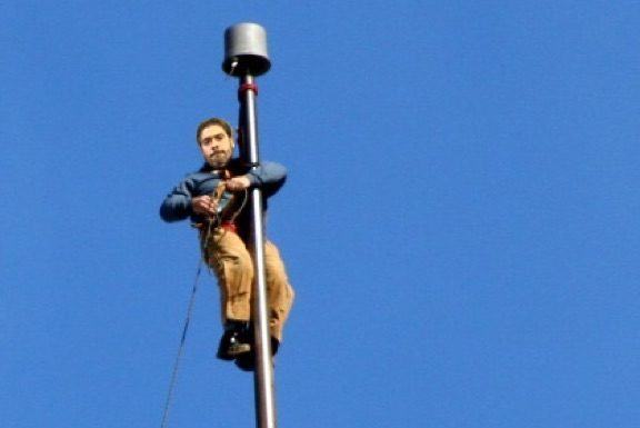 Welfare office hangs Russo’s monthly check from a pole