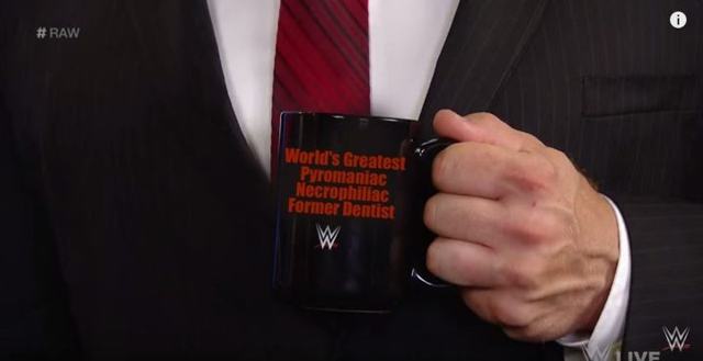 Kane gets “World’s Greatest Pyromaniac Necrophiliac Former Dentist” mug