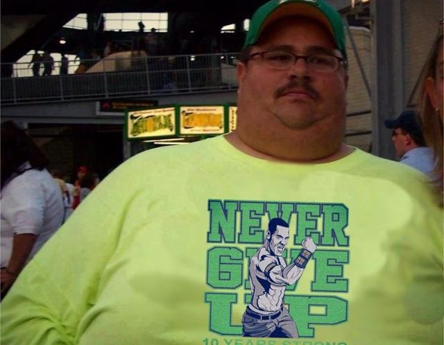 Fan in “Never Give Up” Cena shirt has clearly given up