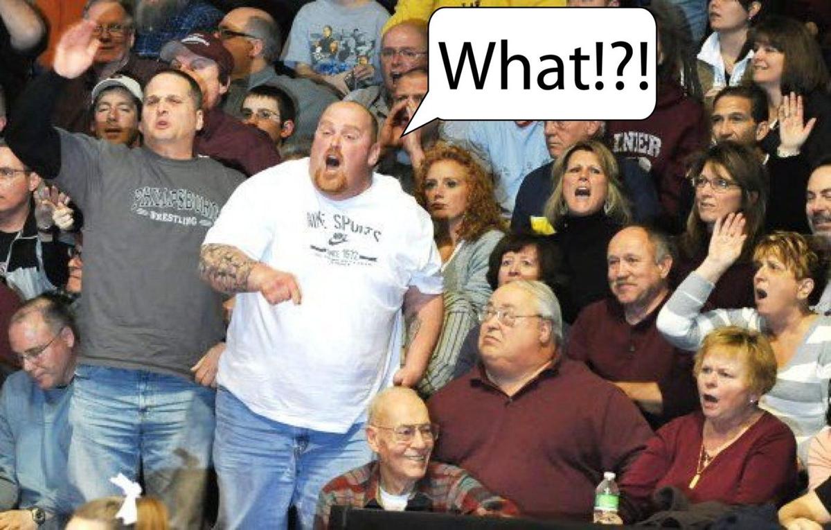 Hearing-impaired wrestling audience justifiably chants “What?!”