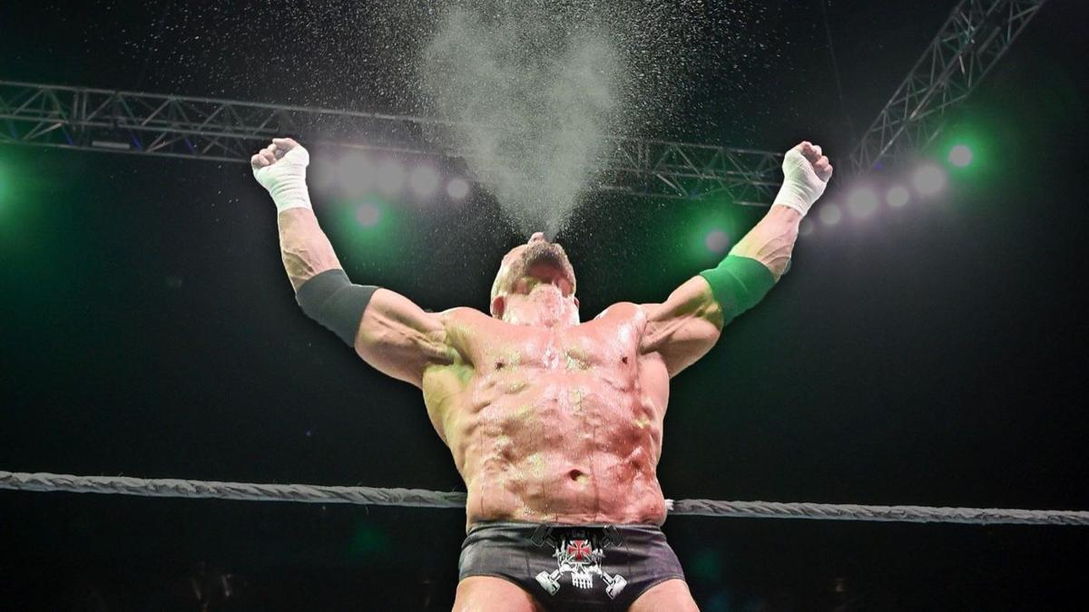Triple H finally manages to drink entire bottle of water without spewing it all over himself