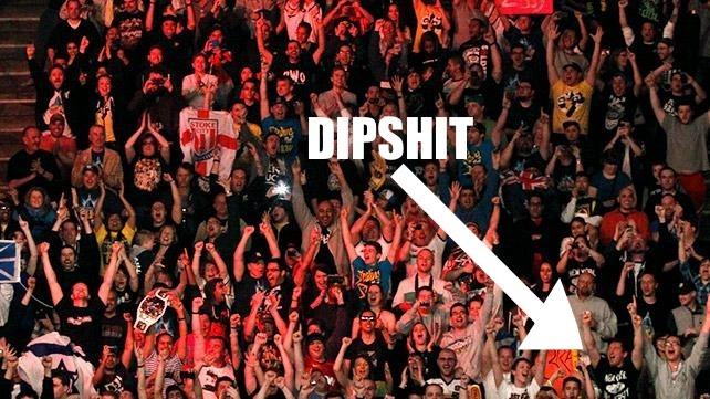 Dipshit in front row spends whole night looking for himself on Titantron