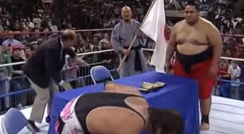 On this day in wrestling history, an in-ring contract signing failed to go smoothly