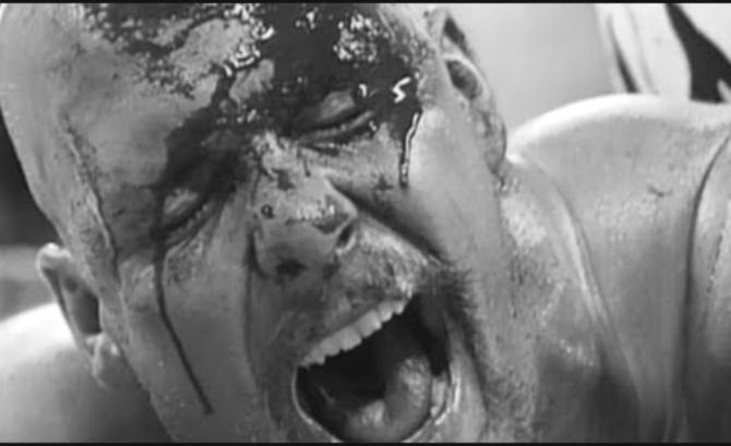 Presence of blood on wrestler magically negated by black-and-white photography