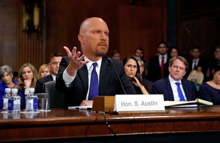 Austin admits to senate inquiry he “drank a few beers” in 1990s but denies drunken ass-whuppings